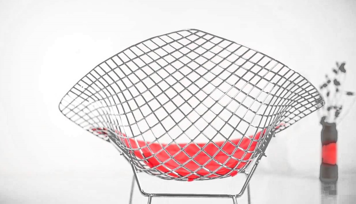 Designed by Hary Bertoia, 1952 650 x 840 x 830 mm Chromed steel, Red PVC Price: 2.220.000 VND
